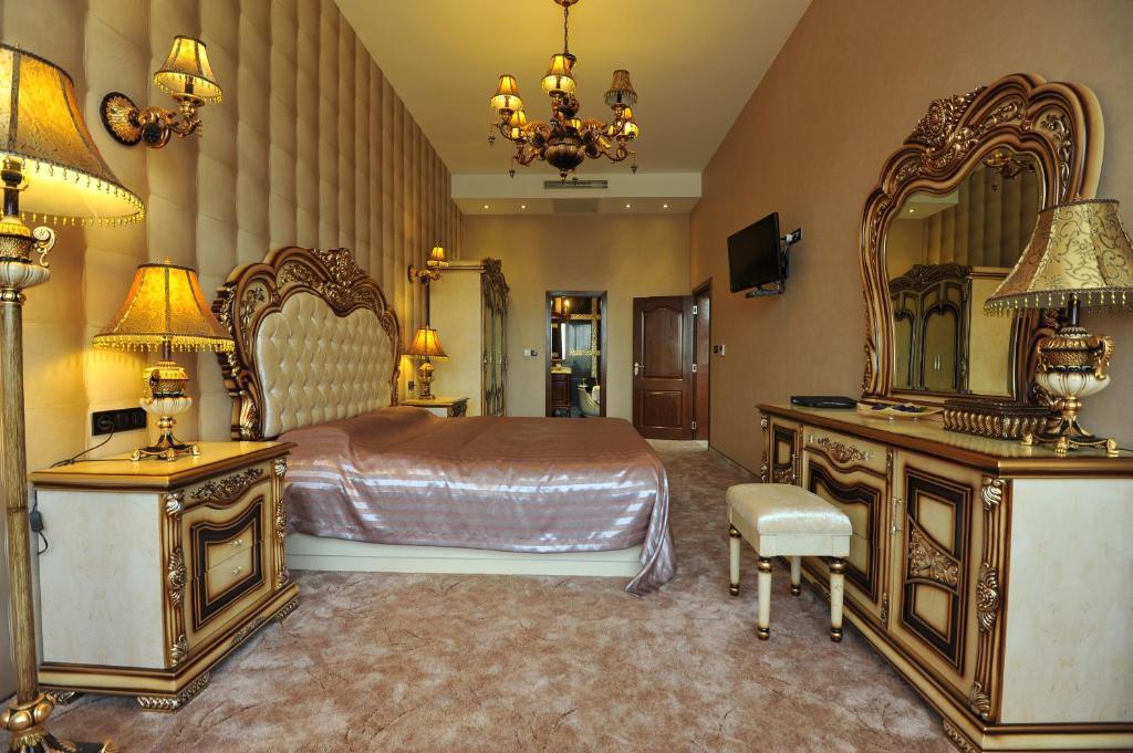 Park Hotel Eski Zağra Oda fotoğraf A bedroom in the hotel